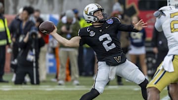 Dec 27, 2024; Birmingham, AL, USA;  Vanderbilt Commodores quarterback Diego Pavia (2) throws the ball against the Georgia Tech Yellow Jackets during the first half of the 2024 Birmingham Bowl at Protective Stadium. Mandatory Credit: Vasha Hunt-Imagn Images