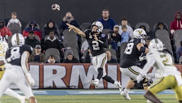 Dec 27, 2024; Birmingham, AL, USA;  Vanderbilt Commodores quarterback Diego Pavia (2) throws the ball on the run against the Georgia Tech Yellow Jackets during the second half of the 2024 Birmingham Bowl at Protective Stadium. Mandatory Credit: Vasha Hunt-Imagn Images
