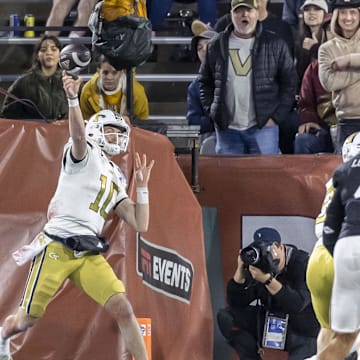 Dec 27, 2024; Birmingham, AL, USA;  Georgia Tech Yellow Jackets quarterback Haynes King (10) throws the ball against the Vanderbilt Commodores during the second half of the 2024 Birmingham Bowl at Protective Stadium. Mandatory Credit: Vasha Hunt-Imagn Images
