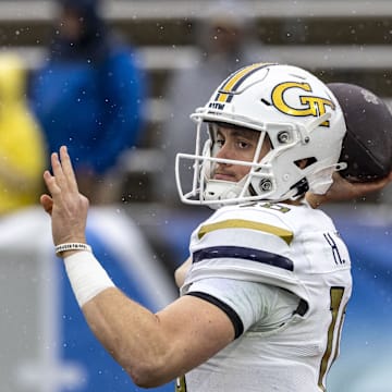 Dec 27, 2024; Birmingham, AL, USA; Georgia Tech Yellow Jackets quarterback Haynes King (10) warms up before the 2024 Birmingham Bowl at Protective Stadium. Mandatory Credit: Vasha Hunt-Imagn Images