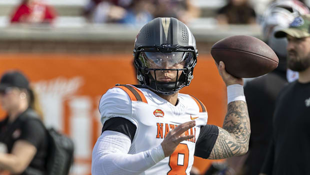 National team quarterback Dillon Gabriel of Oregon (8) warms up before the 2025 Senior Bowl football game