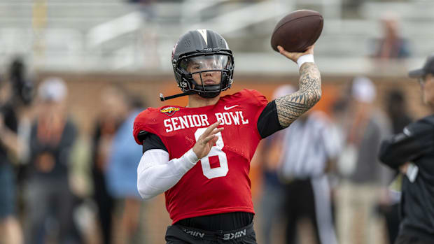 National team quarterback Dillon Gabriel of Oregon (8) works through drills during Senior Bowl practice