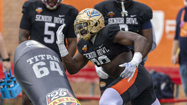 National team defensive lineman Oluwafemi Oladejo of UCLA (99) works through drills during Senior Bowl practice.