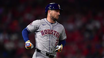Sep 13, 2024; Anaheim, California, USA; Houston Astros third baseman Alex Bregman (2) hits a single against the Los Angeles Angels during the seventh inning at Angel Stadium. Mandatory Credit: Gary A. Vasquez-Imagn Images