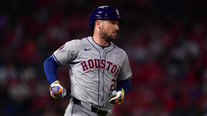 Sep 13, 2024; Anaheim, California, USA; Houston Astros third baseman Alex Bregman (2) hits a single against the Los Angeles Angels during the seventh inning at Angel Stadium. Mandatory Credit: Gary A. Vasquez-Imagn Images