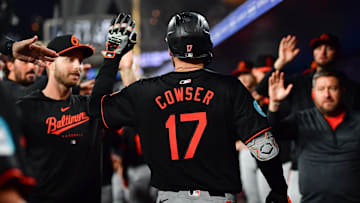 Aug 29, 2024; Los Angeles, California, USA; Baltimore Orioles left fielder Colton Cowser (17) is greeted after hitting a three run home run against the Los Angeles Dodgers during the fifth inning at Dodger Stadium. 