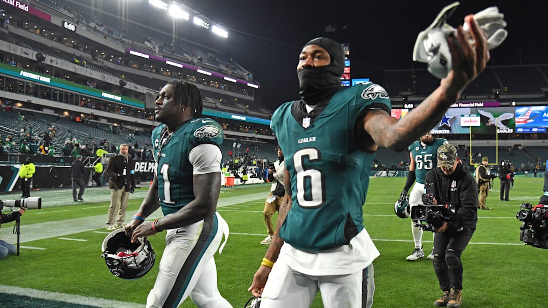 Dec 15, 2024; Philadelphia, Pennsylvania, USA; Philadelphia Eagles wide receiver A.J. Brown (11) and wide receiver DeVonta Smith (6) walk off the field after winning against the Pittsburgh Steelers at Lincoln Financial Field.