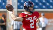 Jan 29, 2025; Mobile, AL, USA; American team quarterback Jaxson Dart of Ole Miss (2) throws the ball during Senior Bowl practice for the National team at Hancock Whitney Stadium. Mandatory Credit: Vasha Hunt-Imagn Images