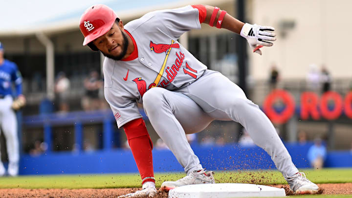 Feb 25, 2025; Dunedin, Florida, USA; St. Louis Cardinals left fielder Victor Scott II (11) reaches third base for a triple against the Toronto Blue Jays in the first inning of a spring training game at TD Ballpark. Mandatory Credit: Jonathan Dyer-Imagn Images