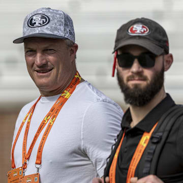 Jan 29, 2025; Mobile, AL, USA; San Francisco 49ers general manager John Lynch watches drills with San Francisco 49ers director of player personnel RJ Gillen during Senior Bowl practice for the American team at Hancock Whitney Stadium. Mandatory Credit: Vasha Hunt-Imagn Images