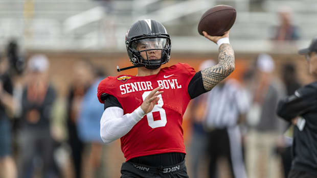 Jan 30, 2025; Mobile, AL, USA; National team quarterback Dillon Gabriel of Oregon (8) works through drills during Senior Bowl