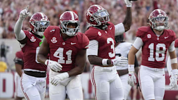 Oct 4, 2025; Tuscaloosa, Alabama, USA;  Alabama defensive back Keon Sabb (3) celebrates his interception with teammates Alabama linebacker Nikhai Hill-Green (41) and Alabama defensive back Bray Hubbard (18) at Saban Field at Bryant-Denny Stadium. Alabama downed Vanderbilt 30-14. Mandatory Credit: Gary Cosby Jr.-Imagn Images