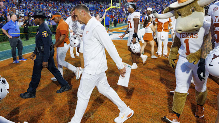 Oct 4, 2025; Gainesville, Florida, USA; Texas Longhorns head coach Steve Sarkisian walks off the field after a game against the Florida Gators at Ben Hill Griffin Stadium.