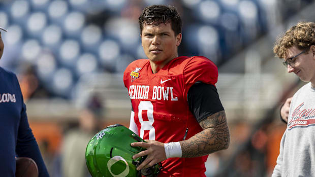 Jan 28, 2025; Mobile, AL, USA; National team quarterback Dillon Gabriel of Oregon (8) pauses after practice during Senior Bow