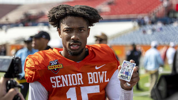 National team wide receiver Tez Johnson of Oregon (15) talks with media members after Senior Bowl practice at Hancock Whitney