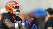 American team linebacker Shemar James of Florida works through drills during Senior Bowl practice for the American team at Hancock Whitney Stadium. 