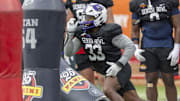 National team defensive lineman David Walker of Central Arkansas (33) works through drills during Senior Bowl practice