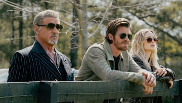Sylvester Stallone as Dwight Manfredi, Garrett Hedlund as Mitch and Bella Heathcote as Cleo in the Paramount+ original series TULSA KING