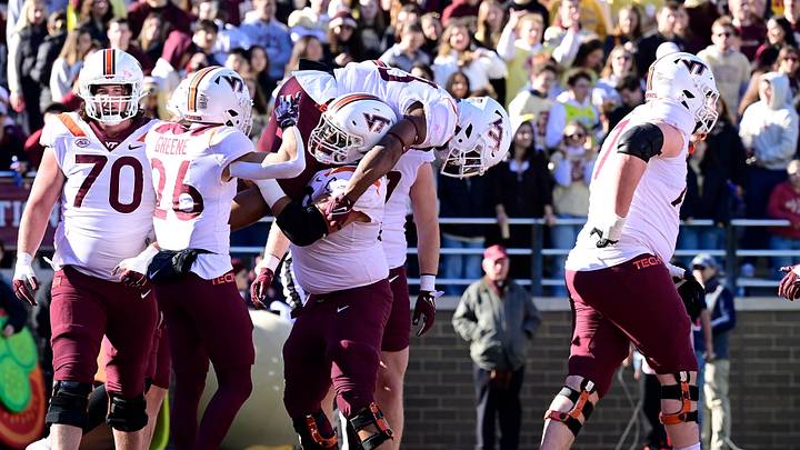 Nov 11, 2023; Chestnut Hill, Massachusetts, USA; Virginia Tech Hokies offensive lineman Kaden Moore (68) celebrates a touchdown by running back Bhayshul Tuten (33) by lifting him onto his shoulders during the first half at Alumni Stadium. Mandatory Credit: Eric Canha-USA TODAY Sports