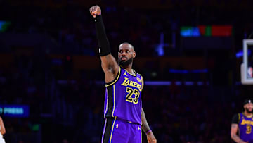Jan 3, 2025; Los Angeles, California, USA;  Los Angeles Lakers forward LeBron James (23) reacts after scoring three point basket against the Atlanta Hawks during the second half at Crypto.com Arena. Mandatory Credit: Gary A. Vasquez-Imagn Images