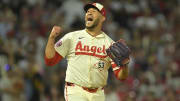 Jul 13, 2024; Anaheim, California, USA;  Carlos Estevez #53 of the Los Angeles Angels celebrates as he earns his 17th save of the season defeating the Seattle Mariners in the ninth inning at Angel Stadium