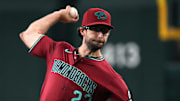 Sep 3, 2025; Phoenix, Arizona, USA; Arizona Diamondbacks pitcher Zac Gallen (23) throws against the Texas Rangers in the first inning at Chase Field. Mandatory Credit: Rick Scuteri-Imagn Images