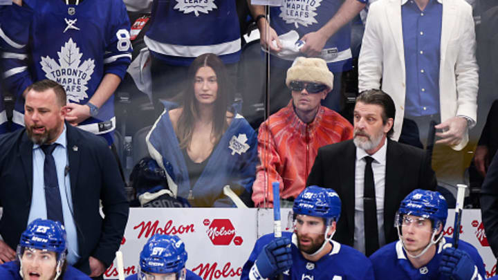 Hailey Bieber and Justin Bieber watch Game Seven of the Second Round of the 2025 Stanley Cup Playoffs between the Toronto Maple Leafs and the Florida Panthers at Scotiabank Arena on May 18, 2025 in Toronto, Ontario, Canada. 
