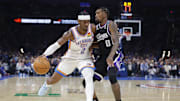 Oct 28, 2025; Oklahoma City, Oklahoma, USA; Oklahoma City Thunder guard Shai Gilgeous-Alexander (2) drives past Sacramento Kings guard Malik Monk (0) during the second half at Paycom Center. Mandatory Credit: Alonzo Adams-Imagn Images