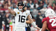 Trevor Lawrence and the Jaguars are road favorites in Tennessee in Week 13.