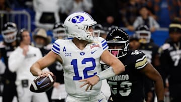 BYU' s Jake Retzlaff looks to pass vs Colorado in the 2024 Valero Alamo Bowl.