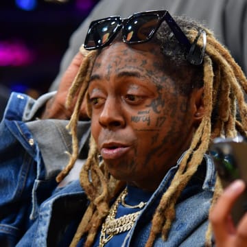 Oct 26, 2023; Los Angeles, California, USA; Recording artist Lil Wayne in attendance as the Los Angeles Lakers play against the Phoenix Suns during the first half at Crypto.com Arena.