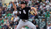 Chicago White Sox pitcher Jonathan Cannon throws a pitch against the Athletics.