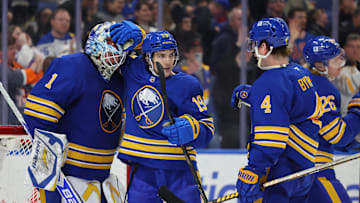 Feb 25, 2025; Buffalo, New York, USA;  The Buffalo Sabres celebrate a win over the Anaheim Ducks at KeyBank Center. Mandatory Credit: Timothy T. Ludwig-Imagn Images