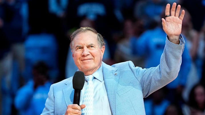 North Carolina football coach Bill Belichick waves to an audience. North Carolina football coach Bill Belichick waves to an audience.