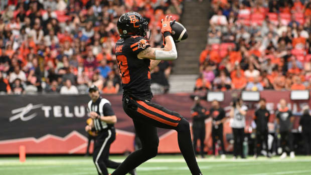 Jun 15, 2024; Vancouver, British Columbia, CAN; BC Lions wide receiver Justin McInnis (18) catches the ball against the Calgary Stampeders during the first half at BC Place. Mandatory Credit: Simon Fearn-USA TODAY Sports
