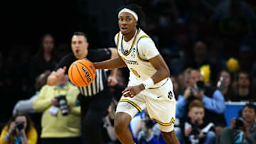 Mar 20, 2025; Wichita, KS, USA; Missouri Tigers guard Anthony Robinson II (0) dribbles in the first half of a first round men’s NCAA Tournament game against the Drake Bulldogs at Intrust Bank Arena. Mandatory Credit: Nick Tre. Smith-Imagn Images