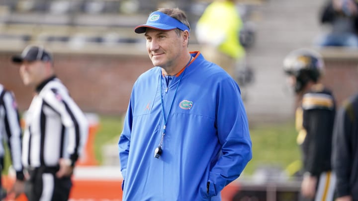 Nov 20, 2021; Columbia, Missouri, USA; Florida Gators head coach Dan Mullen watches team warm ups against the Missouri Tigers before the game at Faurot Field at Memorial Stadium. Mandatory Credit: Denny Medley-USA TODAY Sports