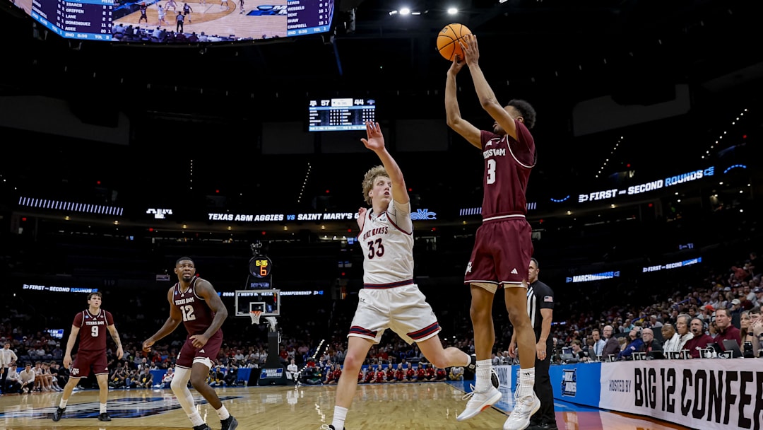 Mar 19, 2026; Oklahoma City, OK, USA; Texas A&M Aggies guard Rylan Griffen (3)takes a shot while Saint Mary's (CA) Gaels guard Liam Campbell (33) moves to block during a first round game of the men's 2026 NCAA Tournament at Paycom Center. 