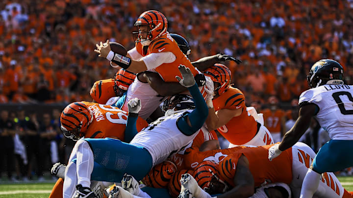 Sep 14, 2025; Cincinnati, Ohio, USA; Cincinnati Bengals quarterback Jake Browning (6) dives for a touchdown against the Jacksonville Jaguars in the second half at Paycor Stadium. Mandatory Credit: Katie Stratman-Imagn Images