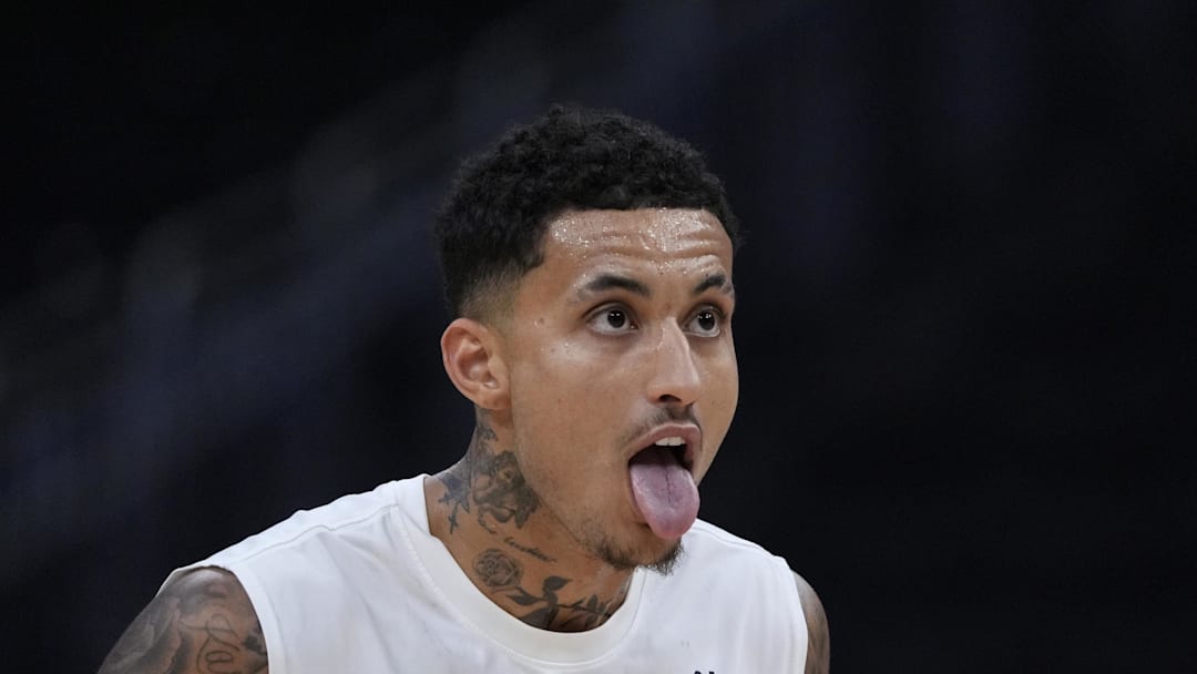 Milwaukee Bucks forward Kyle Kuzma reacts during pregame warmups before a game against the Orlando Magic at Fiserv Forum on March 8.