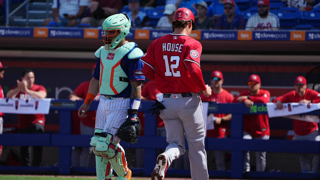 Feb 28, 2026; Port St. Lucie, Florida, USA;  Washington Nationals third baseman Brady House (12) scores a run in the fourth inning against the New York Mets at Clover Park. Mandatory Credit: Jim Rassol-Imagn Images