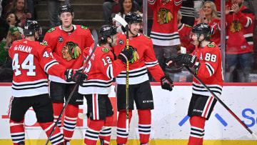 Blackhawks celebrate following Dylan Strome's 17th goal of the season during the 2nd period of a game against the Winnipeg Jets.