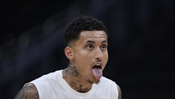 Milwaukee Bucks forward Kyle Kuzma reacts during pregame warmups before a game against the Orlando Magic at Fiserv Forum on March 8.