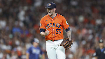 Aug 2, 2024; Houston, Texas, USA; Houston Astros relief pitcher Ryan Pressly (55) reacts after getting an out during the eighth inning against the Tampa Bay Rays at Minute Maid Park. 