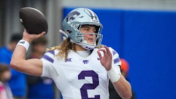 Oct 25, 2025; Lawrence, Kansas, USA; Kansas State Wildcats quarterback Avery Johnson (2) warms up against the Kansas Jayhawks prior to a game at David Booth Kansas Memorial Stadium. 