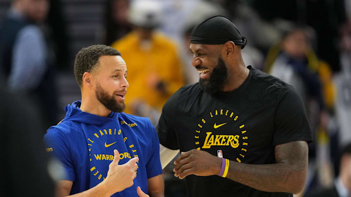 Golden State Warriors guard Stephen Curry (left) and Los Angeles Lakers forward LeBron James.