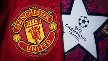 The Manchester United Club Crest with a Champions League Match Ball