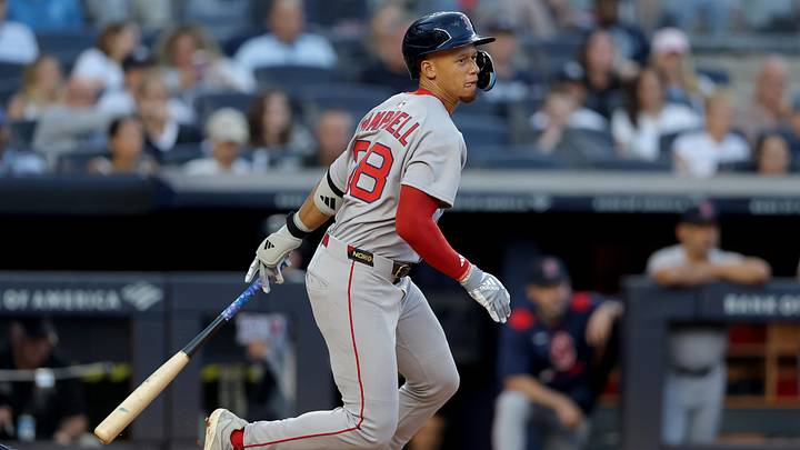 Jun 7, 2025; Bronx, New York, USA; Boston Red Sox second baseman Kristian Campbell (28) follows through on an RBI single against the New York Yankees during the second inning at Yankee Stadium. Mandatory Credit: Brad Penner-Imagn Images
