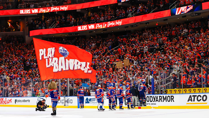 Edmonton Oilers team and fans celebrate after the Oilers defeat the Dallas Stars