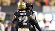 Deion Sanders's belief in Travis Hunter helped give the Jaguars confidence in his ability to play both ways. 